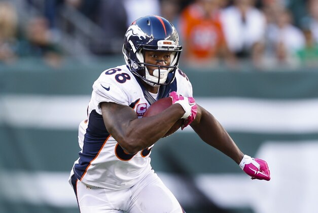 Denver Broncos wide receiver Demaryius Thomas (88) takes the ball up field against the New York Jets during the fourth quarter of an NFL football game, Sunday, Oct. 12, 2014, in East Rutherford, N.J. (AP Photo/Kathy Willens)