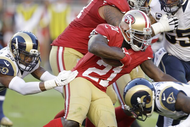 San Francisco 49ers running back Frank Gore (21) runs against the St. Louis Rams during the second half of an NFL football game in Santa Clara, Calif., Sunday, Nov. 2, 2014. (AP Photo/Ben Margot)
