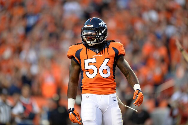 Sep 7, 2014; Denver, CO, USA; Denver Broncos outside linebacker Nate Irving (56) reacts after his sack in the second quarter against the Indianapolis Colts at Sports Authority Field at Mile High. Mandatory Credit: Ron Chenoy-USA TODAY Sports