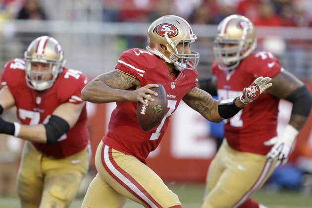 San Francisco 49ers quarterback Colin Kaepernick (7) scrambles against the St. Louis Rams during the fourth quarter of an NFL football game in Santa Clara, Calif., Sunday, Nov. 2, 2014. (AP Photo/Ben Margot)