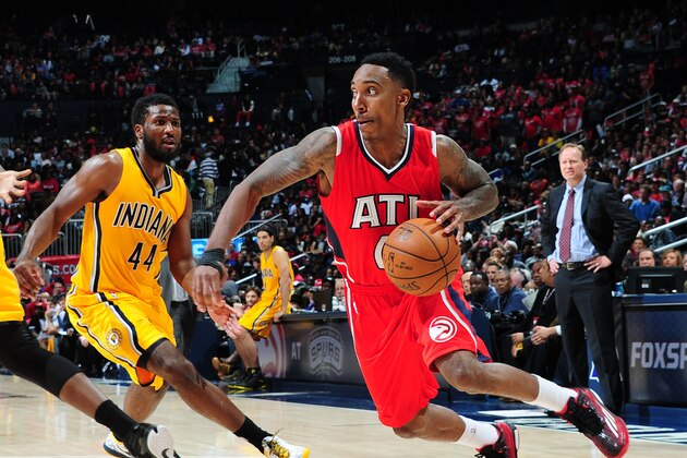ATLANTA, GA - NOVEMBER 1: Jeff Teague #0 of the Atlanta Hawks drives against the Indiana Pacers on November 1, 2014 at Philips Arena in Atlanta, Georgia.  NOTE TO USER: User expressly acknowledges and agrees that, by downloading and/or using this Photograph, user is consenting to the terms and conditions of the Getty Images License Agreement. Mandatory Copyright Notice: Copyright 2014 NBAE (Photo by Scott Cunningham/NBAE via Getty Images)