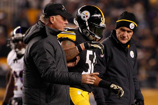 PITTSBURGH, PA - NOVEMBER 02:  Ryan Shazier #50 of the Pittsburgh Steelers is helped to the sideline after being injured during the first quarter against the Baltimore Ravens at Heinz Field on November 2, 2014 in Pittsburgh, Pennsylvania.  (Photo by Justin K. Aller/Getty Images)