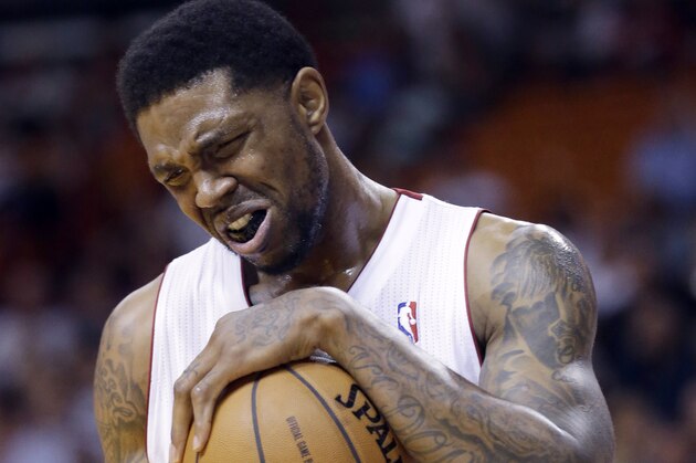 Miami Heat forward Udonis Haslem reacts after a play during the second half of an NBA basketball game against the Philadelphia 76ers, Wednesday, April 16, 2014, in Miami. The 76ers defeated the Heat 100-87. (AP Photo/Wilfredo Lee)