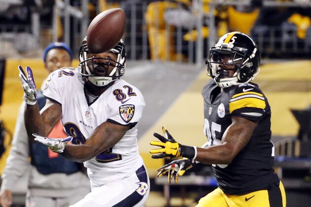 Baltimore Ravens wide receiver Torrey Smith (82) makes a touchdown catch past Pittsburgh Steelers cornerback Brice McCain (25) in the first quarter of the NFL football game, Sunday, Nov. 2, 2014, in Pittsburgh. (AP Photo/Gene Puskar)