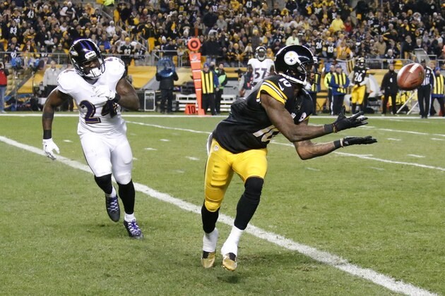Pittsburgh Steelers wide receiver Martavis Bryant (10) makes a touchdown catch past Baltimore Ravens free safety Darian Stewart (24) in the second quarter of the NFL football game, Sunday, Nov. 2, 2014 in Pittsburgh. (AP Photo/Gene Puskar)