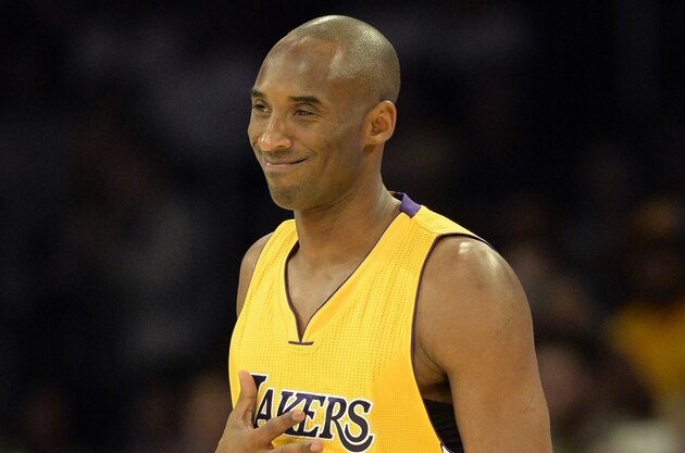 Oct 9, 2014; Los Angeles, CA, USA; Los Angeles Lakers guard Kobe Bryant (24) reacts during the first half against the Golden State Warriors at Staples Center. Mandatory Credit: Richard Mackson-USA TODAY Sports