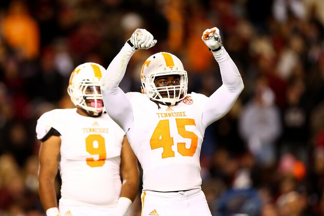 COLUMBIA, SC - NOVEMBER 01:  Teammate Derek Barnett #9 and A.J. Johnson #45 of the Tennessee Volunteers wait for a play against the South Carolina Gamecocks during their game at Williams-Brice Stadium on November 1, 2014 in Columbia, South Carolina.  (Photo by Streeter Lecka/Getty Images)
