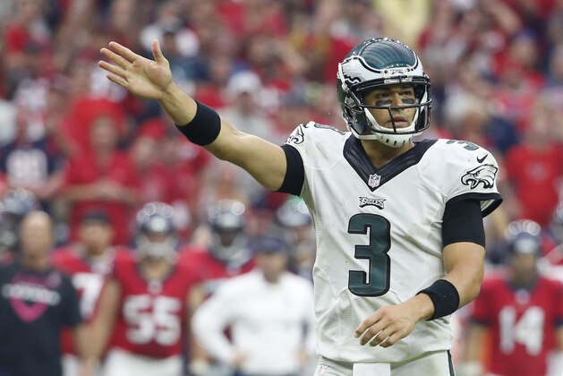 Philadelphia Eagles quarterback Mark Sanchez (3) signals to the sidelines during the fourth quarter of an NFL football game, Sunday, Nov. 2, 2014, in Houston. (AP Photo/Tony Gutierrez)