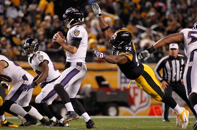 PITTSBURGH, PA - NOVEMBER 02:  Joe Flacco #5 of the Baltimore Ravens is sacked by James Harrison #92 of the Pittsburgh Steelers during the first quarter at Heinz Field on November 2, 2014 in Pittsburgh, Pennsylvania.  (Photo by Justin K. Aller/Getty Images)