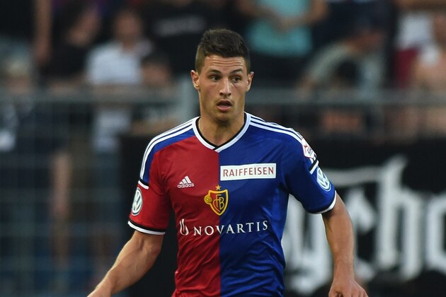 BASEL, SWITZERLAND - AUGUST 09:  Fabian Schar of FC Basel in action during the Raiffeisen Super League match between FC Basel and FC Zurich at St. Jakob-Park on August 9, 2014 in Basel, Switzerland.  (Photo by Valerio Pennicino/Getty Images)