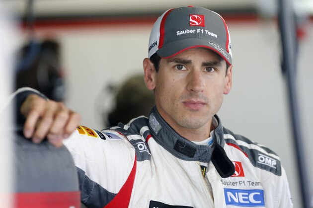 Germany's Adrian Sutil of the Sauber F1 team waits at the pit lane during the third free practice at the Monza racetrack, in Monza, Italy, Saturday, Sept. 6 , 2014. The Formula one race will be held on Sunday. (AP Photo/Alessandro Trovati)
