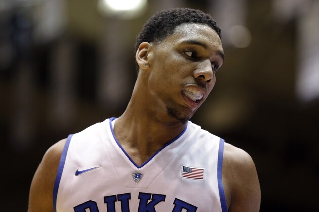 In this Saturday, Oct. 25, 2014, photo, Duke's Jahlil Okafor reacts during an NCAA college basketball scrimmage at Cameron Indoor Stadium in Durham, N.C.  With a lineup stacked with four blue-chip freshmen talented enough to jump to the NBA after one year, these Blue Devils look an awful lot like some recent Kentucky teams. (AP Photo/Gerry Broome)