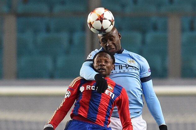 KHIMKI, RUSSIA - OCTOBER 21: Ahmed Musa (L) of PFC CSKA Moscow challenged by Eliaquim Mangala of Manchester City FC during the UEFA Champions League Group E match between PFC CSKA Moscow and Manchester City FC at the Arena Khimki Stadium on October 21, 2014 in Khimki, Russia.  (Photo by Epsilon/Getty Images)