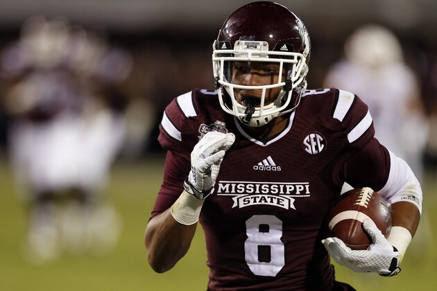STARKVILLE, MS - NOVEMBER 1:  Fred Ross #8 of the Mississippi State Bulldogs catches a pass and takes it in for the touchdown against the Arkansas Razorbacks in the second half at Davis Wade Stadium on November 1, 2014 in Starkville, Mississippi. (Photo by Butch Dill/Getty Images)