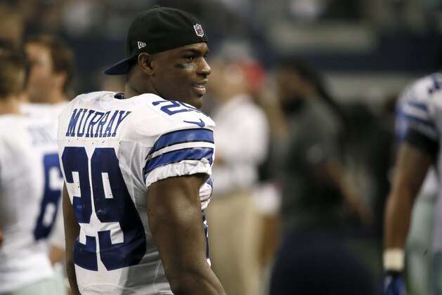 Dallas Cowboys running back DeMarco Murray (29) walks through the team bench area during an NFL football game against the Washington Redskins, Monday, Oct. 27, 2014, in Arlington, Texas. (AP Photo/Brandon Wade)