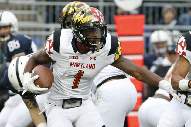 Maryland wide receiver Stefon Diggs (1) returns a punt during the first half of an NCAA college football game against Penn State in State College, Pa., Saturday, Nov. 1, 2014. (AP Photo/Gene J. Puskar)