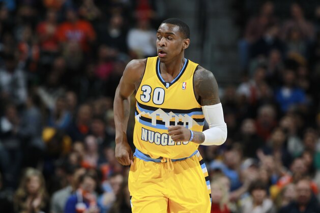 Denver Nuggets forward Quincy Miller runs court against the Toronto Raptors in the first quarter of an NBA basketball game in Denver on Friday, Jan. 31, 2014. (AP Photo/David Zalubowski)