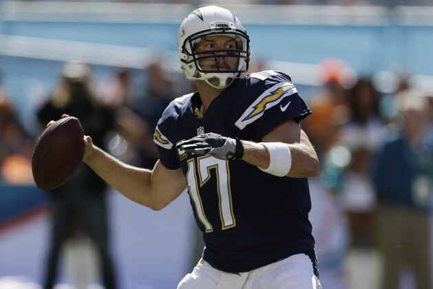 San Diego Chargers quarterback Philip Rivers (17) looks to pass during the first half of an NFL football game against the Miami Dolphins, Sunday, Nov. 2, 2014, in Miami Gardens, Fla.  (AP Photo/Alan Diaz)