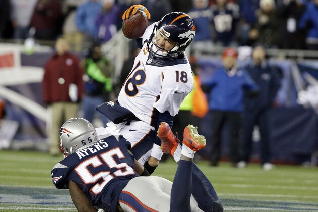 New England Patriots linebacker Akeem Ayers (55) sacks Denver Broncos quarterback Peyton Manning (18) in the first half of an NFL football game on Sunday, Nov. 2, 2014, in Foxborough, Mass. (AP Photo/Steven Senne)