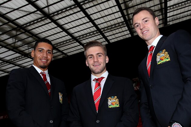MANCHESTER, ENGLAND - OCTOBER 27:  Chris Smalling, Luke Shaw and Jonny Evans pose during the Bulova AccuSwiss Squad Watch Collection launch at Old Trafford on October 27, 2014 in Manchester, England.  (Photo by Jan Kruger/Getty Images for BULOVA)