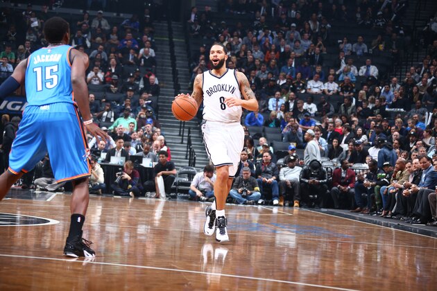 NEW YORK, NY - NOVEMBER 3:  Deron Williams #8 of the Brooklyn Nets dribbles against Reggie Jackson #15 of the Oklahoma City Thunder on November 3, 2014 at the Barclays Center in the Brooklyn borough of New York City. NOTE TO USER: User expressly acknowledges and agrees that, by downloading and or using this Photograph, user is consenting to the terms and conditions of the Getty Images License Agreement. Mandatory Copyright Notice: Copyright 2014 NBAE (Photo by Nathaniel S. Butler/NBAE via Getty Images)
