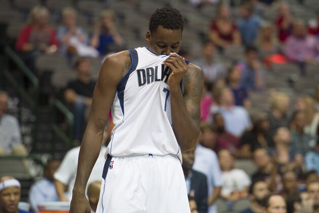 Oct 10, 2014; Dallas, TX, USA; Dallas Mavericks forward Al-Farouq Aminu (7) fouls out during the second half against the Oklahoma City Thunder at the American Airlines Center. The Thunder defeated the Mavericks 118-109. Mandatory Credit: Jerome Miron-USA TODAY Sports