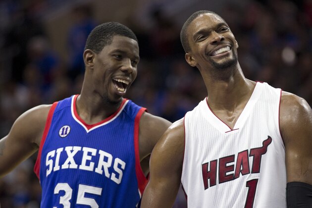 PHILADELPHIA, PA - NOVEMBER 1: Henry Sims #35 of the Philadelphia 76ers talks to Chris Bosh #1 of the Miami Heat in between foul shots in the second half of the game on November 1, 2014 at the Wells Fargo Center in Philadelphia, Pennsylvania. NOTE TO USER: User expressly acknowledges and agrees that, by downloading and or using this photograph, User is consenting to the terms and conditions of the Getty Images License Agreement The Heat defeated the 76ers 114-96 (Photo by Mitchell Leff/Getty Images)