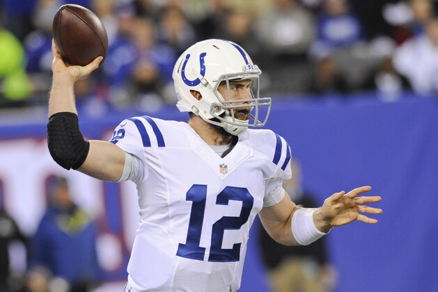 Indianapolis Colts quarterback Andrew Luck (12) throws a pass during the first half of an NFL football game against the New York Giants Monday, Nov. 3, 2014, in East Rutherford, N.J.  (AP Photo/Bill Kostroun)