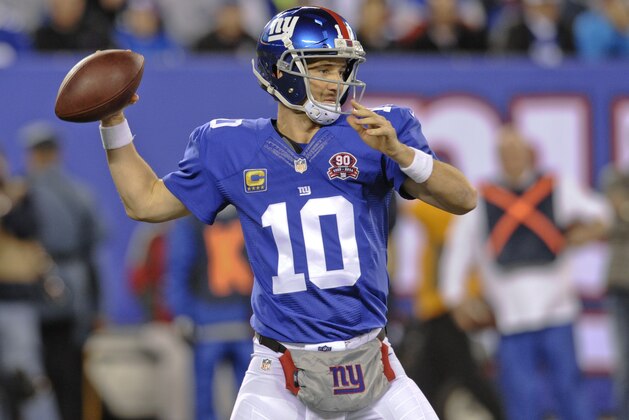 New York Giants' Eli Manning throws a pass during the first half of an NFL football game against the Indianapolis Colts Monday, Nov. 3, 2014, in East Rutherford, N.J.  (AP Photo/Bill Kostroun)