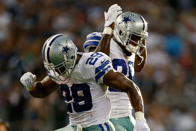 ARLINGTON, TX - OCTOBER 19:  DeMarco Murray #29 and Dez Bryant #88 of the Dallas Cowboys celebrate against the New York Giants in the second half at AT&T Stadium on October 19, 2014 in Arlington, Texas.  (Photo by Wesley Hitt/Getty Images)