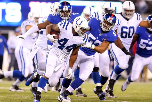 Nov 3, 2014; East Rutherford, NJ, USA; Indianapolis Colts running back Ahmad Bradshaw (44) runs the ball against the New York Giants during the second quarter at MetLife Stadium. Mandatory Credit: Brad Penner-USA TODAY Sports