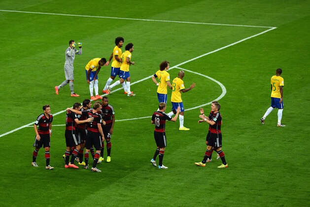 BELO HORIZONTE, BRAZIL - JULY 08:  Sami Khedira of Germany celebrates with his team-mates after scoring their fifth goal during the 2014 FIFA World Cup Brazil Semi Final match between Brazil and Germany at Estadio Mineirao on July 8, 2014 in Belo Horizonte, Brazil.  (Photo by Jamie McDonald/Getty Images)
