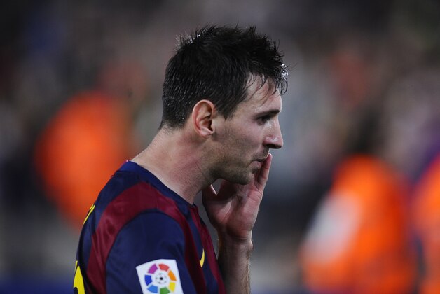 FC Barcelona's Lionel Messi from Argentina reacts during a Spanish La Liga soccer match against Celta de Vigo at the Camp Nou stadium in Barcelona, Spain, Saturday, Nov. 1, 2014. (AP Photo/Manu Fernandez)