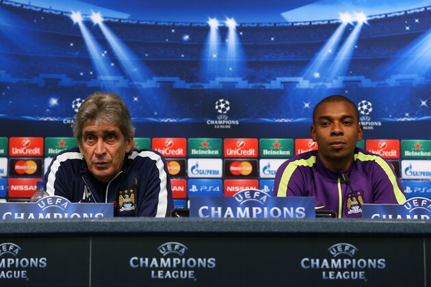 MANCHESTER, ENGLAND - NOVEMBER 04:  Manuel Pellegrini the manager of Manchester City and Fernandinho face the media during a press conference at the Etihad Stadium on November 4, 2014 in Manchester, England.  (Photo by Alex Livesey/Getty Images)