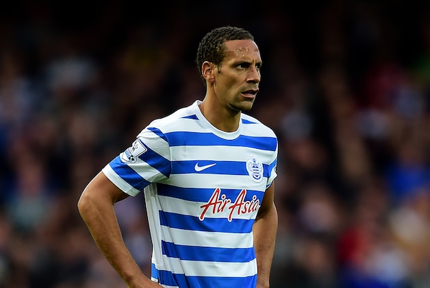 LONDON, ENGLAND - OCTOBER 05:  Rio Ferdinand of QPR reacts during the Barclays Premier League match between West Ham United and Queens Park Rangers at Boleyn Ground on October 5, 2014 in London, England.  (Photo by Jamie McDonald/Getty Images)