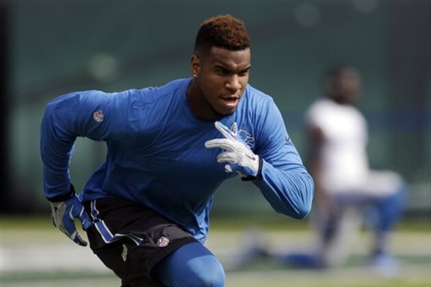 Detroit Lions tight end Eric Ebron warms up prior to an NFL football game against the New York Jets, Sunday, Sept. 28, 2014, in East Rutherford, N.J. (AP Photo/Frank Franklin II)
