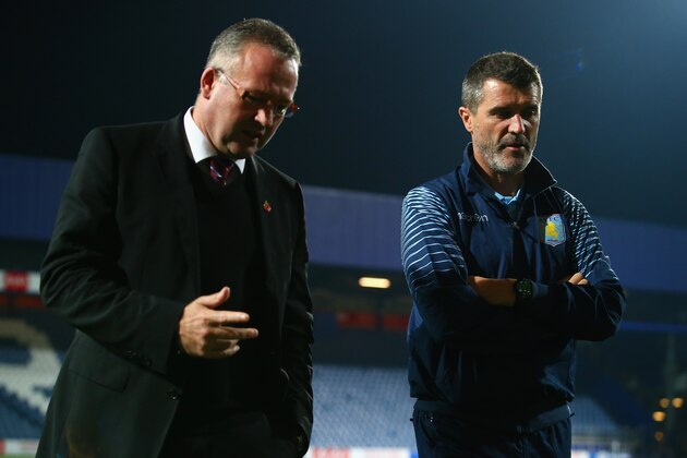 LONDON, ENGLAND - OCTOBER 27:  Manager Paul Lambert of Aston Villa and  Roy Keane, Aston Villa assistant manager walk on the pitch prior to the Barclays Premier League match between Queens Park Rangers and Aston Villa at Loftus Road on October 27, 2014 in London, England.  (Photo by Clive Rose/Getty Images)