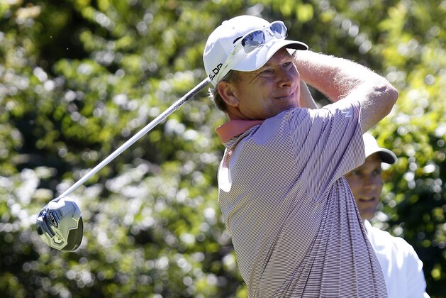 Woody Austin, the 2013 Sanderson Farms Championship winner, watches on drive on the No. 17 hole at the Country Club of Jackson, where the PGA Tour event has relocated, Monday, Sept. 22, 2014, in Jackson, Miss. After 18 years at Annandale Golf Course in Madison, the state's only regular PGA Tour event relocated to Jackson. Austin attended a Media Day and played a few holes on the new tournament golf course. (AP Photo/Rogelio V. Solis)