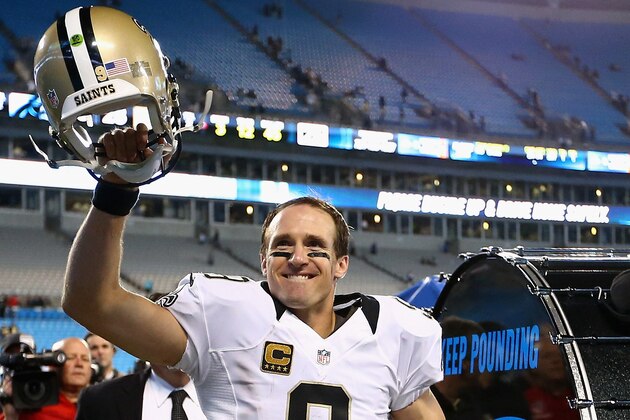 CHARLOTTE, NC - OCTOBER 30:  Drew Brees #9 of the New Orleans Saints celebrates after defeating the Carolina Panthers 28-10 at Bank of America Stadium on October 30, 2014 in Charlotte, North Carolina.  (Photo by Streeter Lecka/Getty Images)