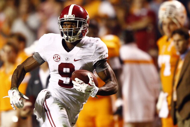 Alabama wide receiver Amari Cooper (9) runs for a touchdown in the first quarter of an NCAA college football game against Tennessee, Saturday, Oct. 25, 2014, in Knoxville, Tenn. (AP Photo/Wade Payne)
