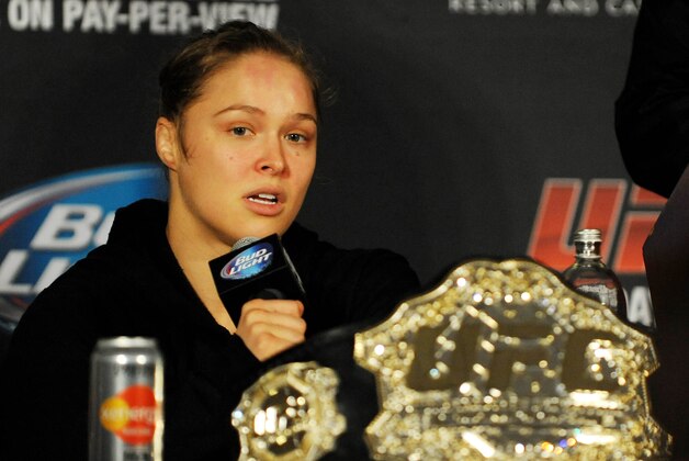Feb 22, 2014; Las Vegas, NV, USA; UFC women's bantamweight champion Ronda Rousey answers questions from reporters after defending her title against Sara McMann in the first round of the main event of UFC 170 at Mandalay Bay.  Mandatory Credit: Stephen R. Sylvanie-USA TODAY Sports