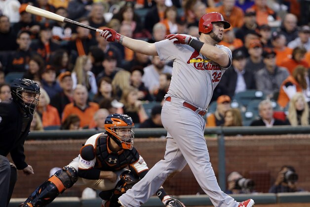 St. Louis Cardinals' Matt Adams hits a home run during the fourth inning of Game 5 of the National League baseball championship series against the San Francisco Giants Thursday, Oct. 16, 2014, in San Francisco. (AP Photo/David J. Phillip)