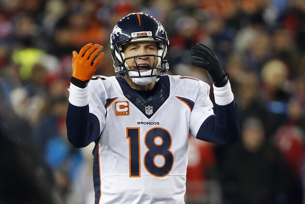 Denver Broncos quarterback Peyton Manning (18) signals in the first half an NFL football game against the New England Patriots on Sunday, Nov. 2, 2014, in Foxborough, Mass. (AP Photo/Elise Amendola)