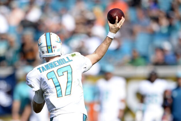 Oct 26, 2014; Jacksonville, FL, USA; Miami Dolphins quarterback Ryan Tannehill (17) throws the ball against the Jacksonville Jaguars at EverBank Field. Mandatory Credit: Richard Dole-USA TODAY Sports