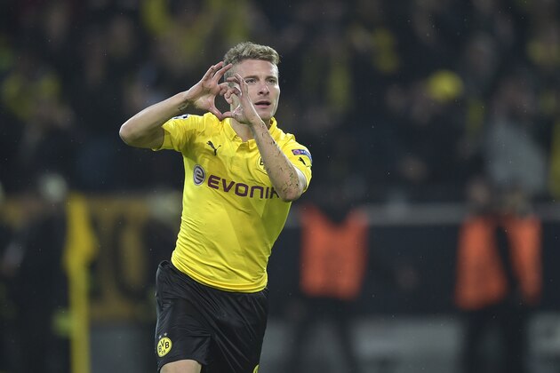 Dortmund's Ciro Immobile celebrates after scoring his side's 3rd goal during the Champions League group D soccer match between Borussia Dortmund and Galatasaray Istanbul in Dortmund, Germany, Tuesday, Nov.4, 2014. (AP Photo/Martin Meissner)