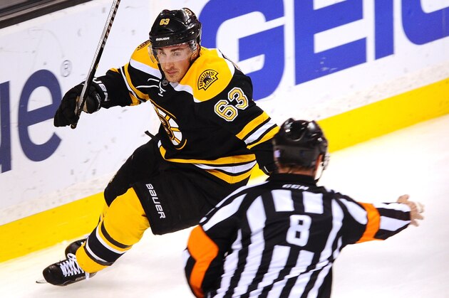 BOSTON, MA - NOVEMBER 4: Brad Marchand #63 of the Boston Bruins scores in overtime against the Florida Panthers at the TD Garden on November 4, 2014 in Boston, Massachusetts.  (Photo by Steve Babineau/NHLI via Getty Images)