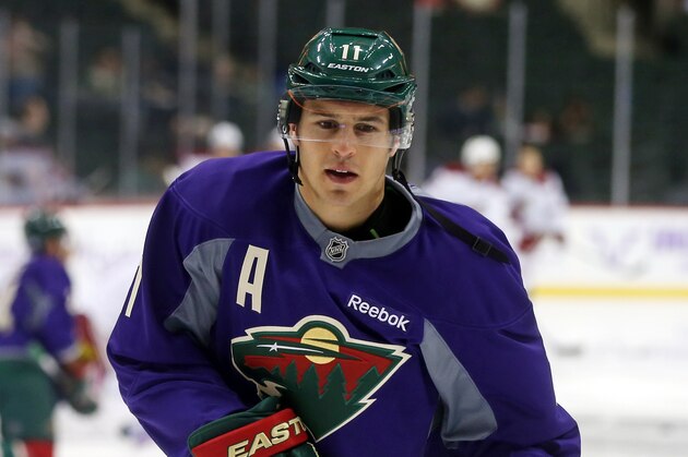 Minnesota Wild left wing Zach Parise warms up prior to an NHL hockey game against the Arizona Coyotes, Thursday, Oct. 23, 2014, in St. Paul, Minn. (AP Photo/Jim Mone)