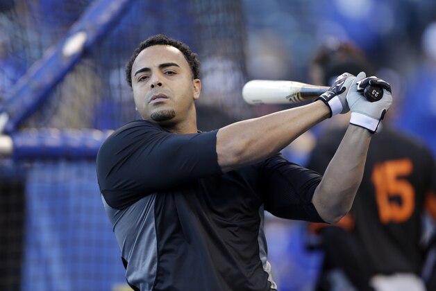 Baltimore Orioles' Nelson Cruz swings during batting practice for Game 3 of the American League baseball championship series against the Kansas City Royals Tuesday, Oct. 14, 2014, in Kansas City, Mo. (AP Photo/Chris O'Meara)
