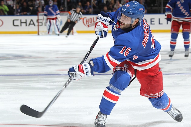 NEW YORK, NY - OCTOBER 19:  Derick Brassard #16 of the New York Rangers shoots the puck against the San Jose Sharks at Madison Square Garden on October 19, 2014 in New York City. The New York Rangers won 4-0. (Photo by Jared Silber/NHLI via Getty Images)