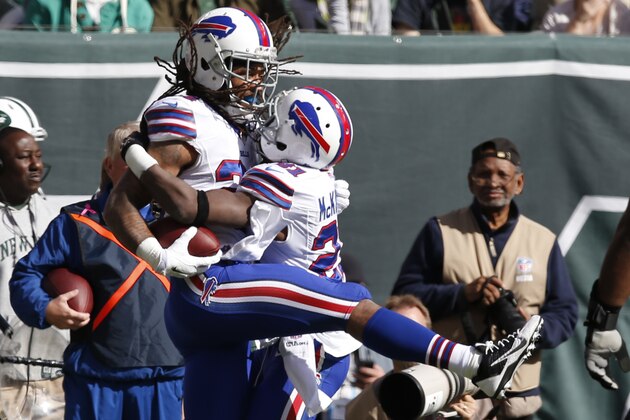 Buffalo Bills cornerback Stephon Gilmore (24) celebrates with Leodis McKelvin (21) after an interception during the first half of an NFL football game Sunday, Oct. 26, 2014, in East Rutherford.  (AP Photo/Kathy Willens)